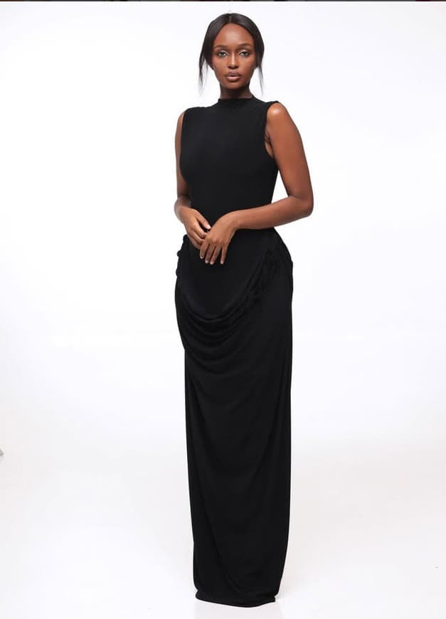 A floor-length draped gown from the House of Sham Tyra.